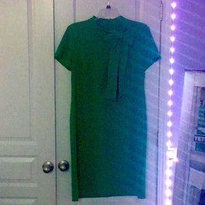 Shelby Palmer emerald green dress with bow